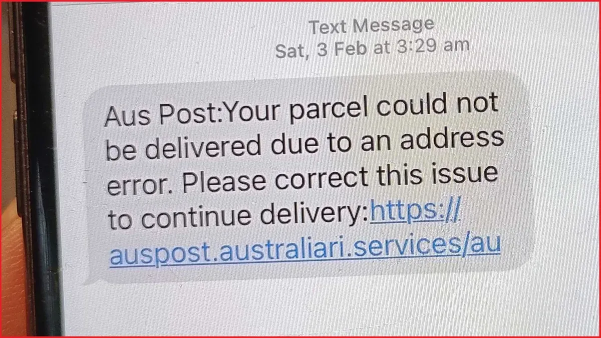 Person viewing Australia Post scam text message on smartphone screen