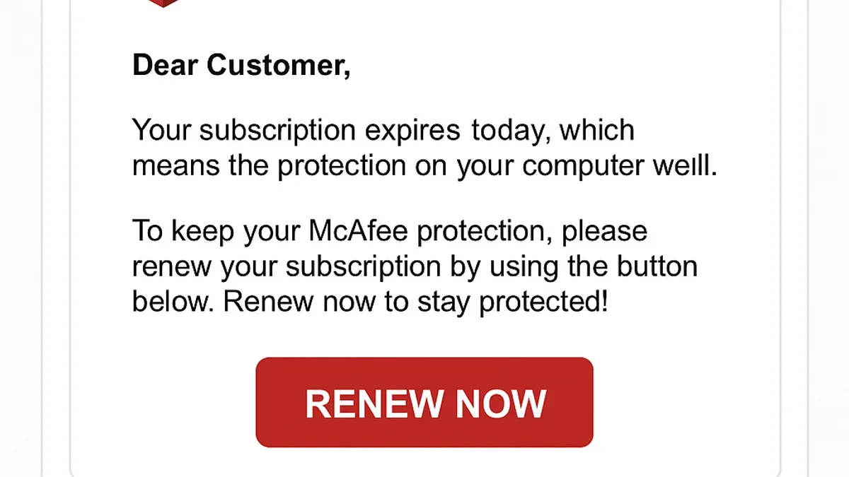 Person reviewing email warning about McAfee renewal scam email on laptop screen