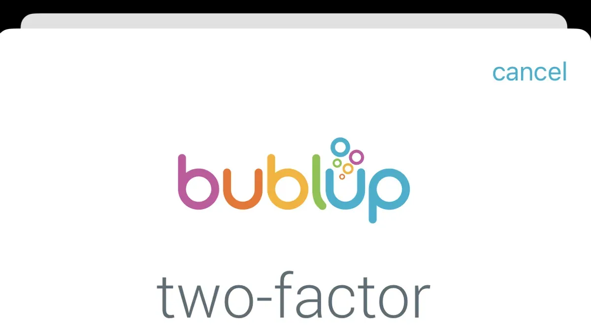 Person troubleshooting Bumble two-factor authentication code not working on smartphone