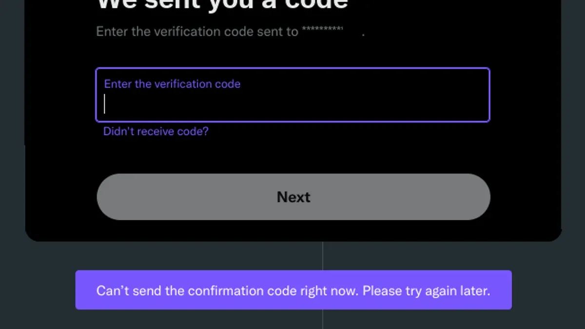 Person fixing X (Twitter) two-factor authentication code not working on smartphone