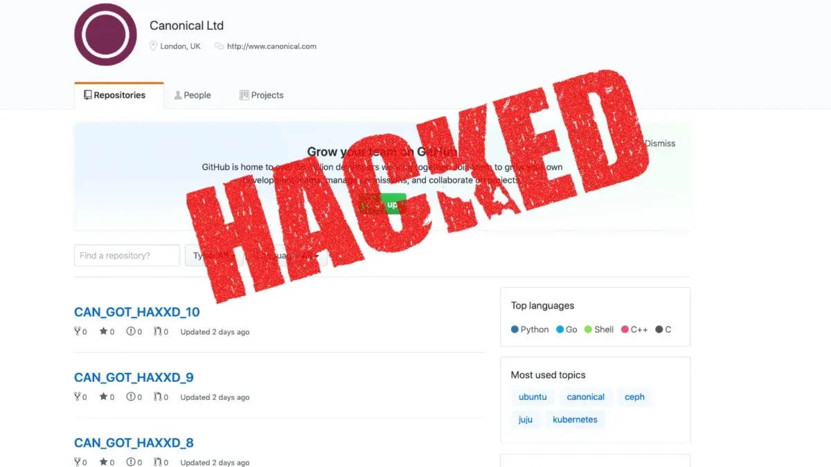 Developer recovering a GitHub account hacked with code visible on laptop screen