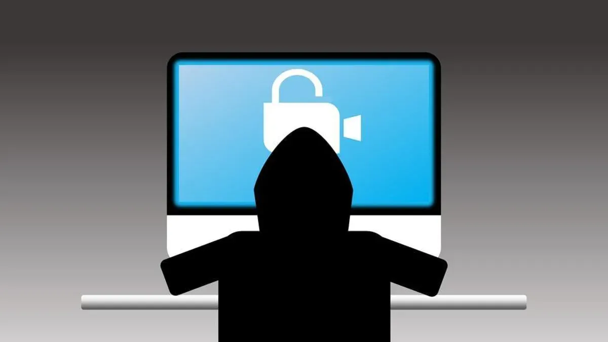 User securing a Zoom account hacked or locked on laptop in home office