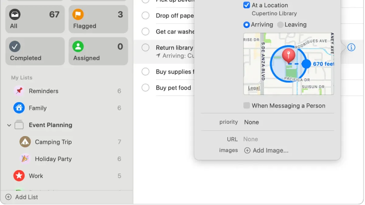 User setting location reminders in Reminders on Mac on a laptop