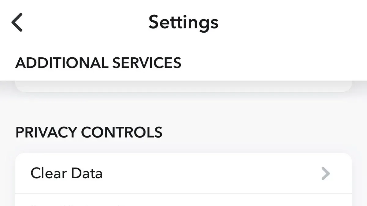User managing Snapchat privacy settings on smartphone screen