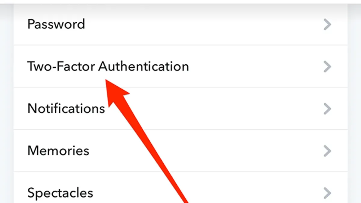 User enabling two-factor authentication on Snapchat on a smartphone
