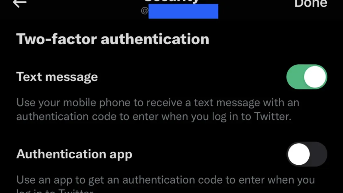User enabling two-factor authentication on Tinder app on smartphone