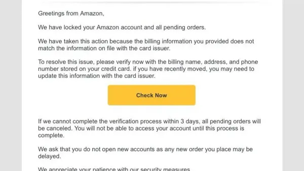 Person reviewing an email inbox with an Amazon scam email visible on the screen