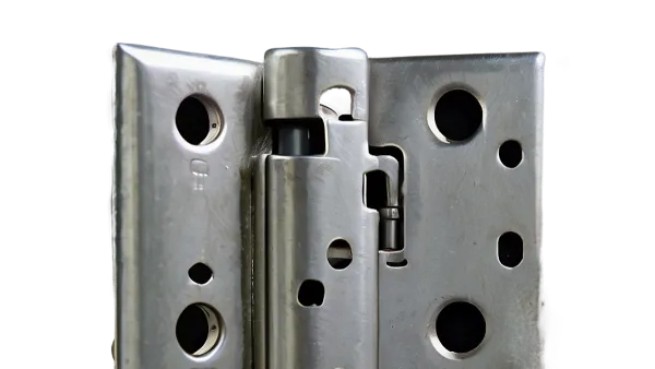 User managing Hinge privacy settings on phone with home door hinge visible