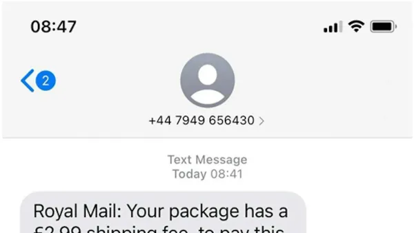Person reviewing a Royal Mail scam text message on their smartphone