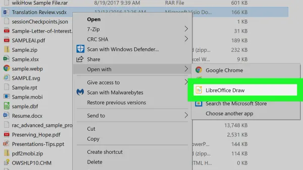 User opening a.vsdx file on Mac laptop screen