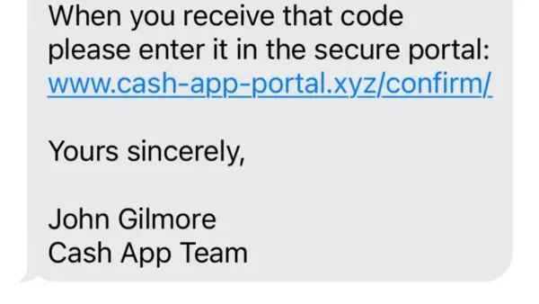 User securing Cash App account hacked with phone in hand