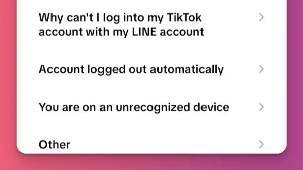 User handling a TikTok account hacked issue on smartphone