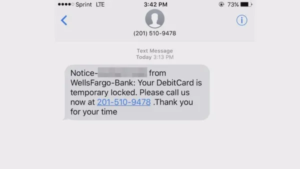 Person viewing Wells Fargo scam text message alert on smartphone screen