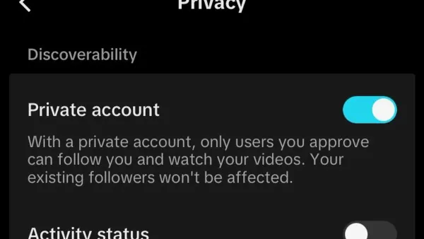 User managing TikTok privacy settings on smartphone for better control