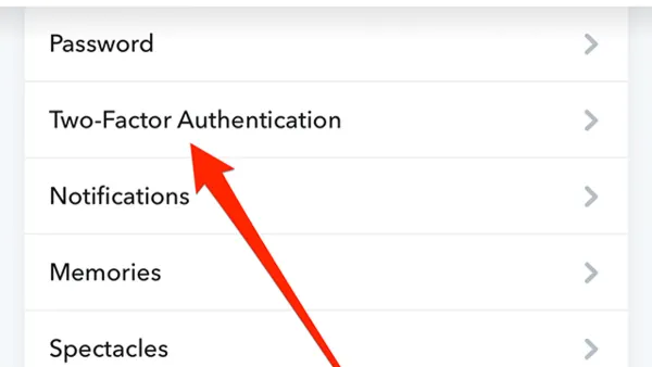 User enabling two-factor authentication on Snapchat on a smartphone